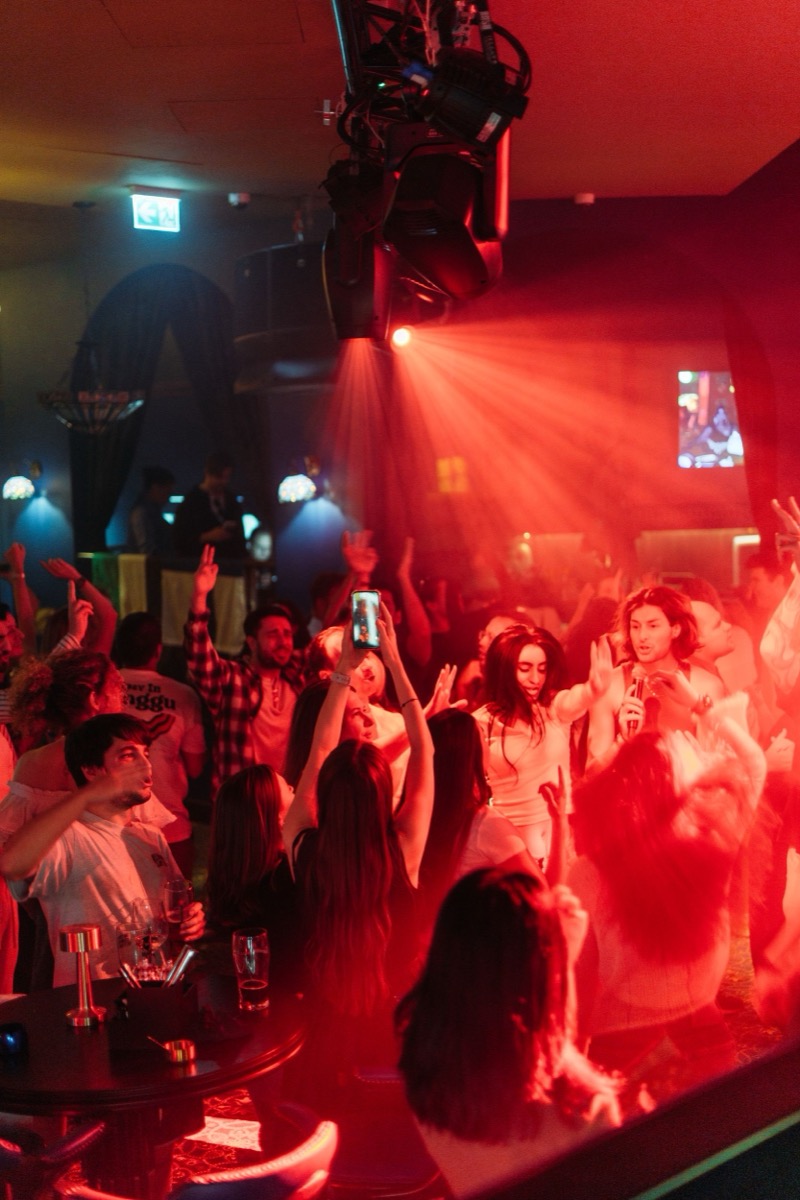 Crowded dance floor at a LeverTech party in Dubai